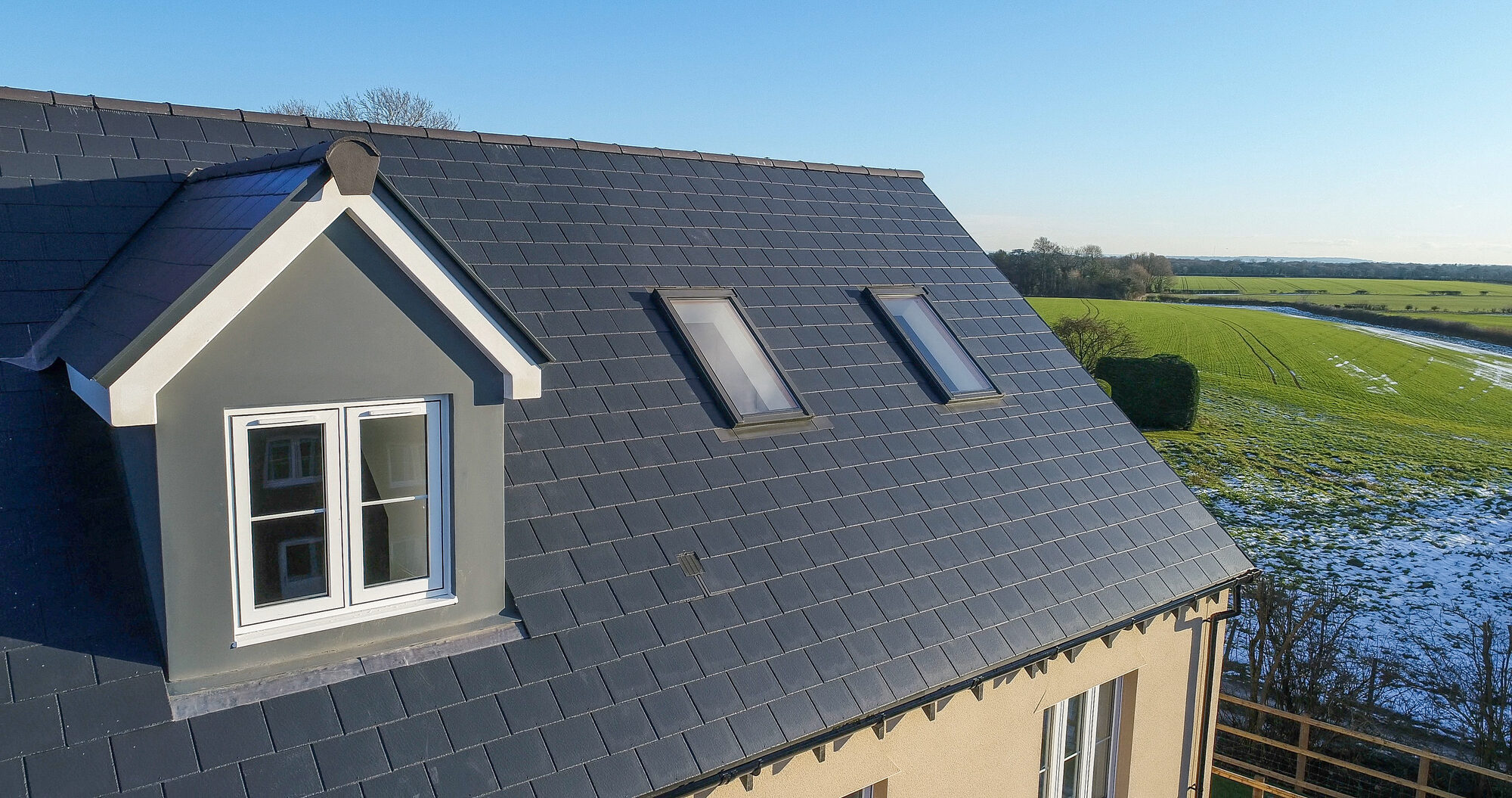 UK residential house with a brand new slate roof